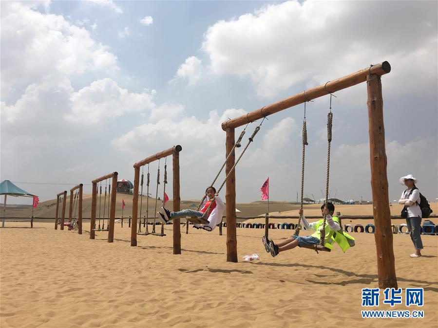 (新華全媒頭條·在習(xí)近平新時代中國特色社會主義思想指引下——新時代新作為新篇章·圖文互動)(11)綠富同興畫卷在沙海中鋪展——庫布其沙漠生態(tài)治理紀(jì)實(shí)
